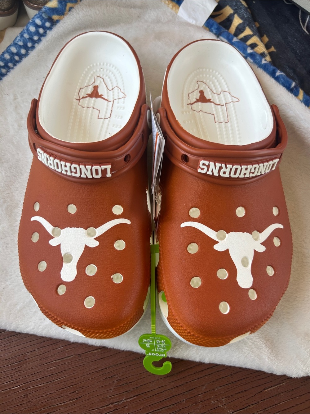 CROCS Women's Burnt Orange Slip-On Clogs with White Longhorn Graphic